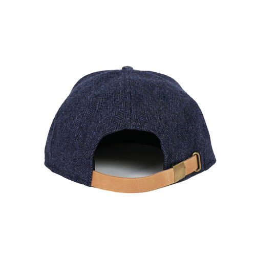 Back View of Navy Straight Bill Hat with leather buckle strap & metal clasp