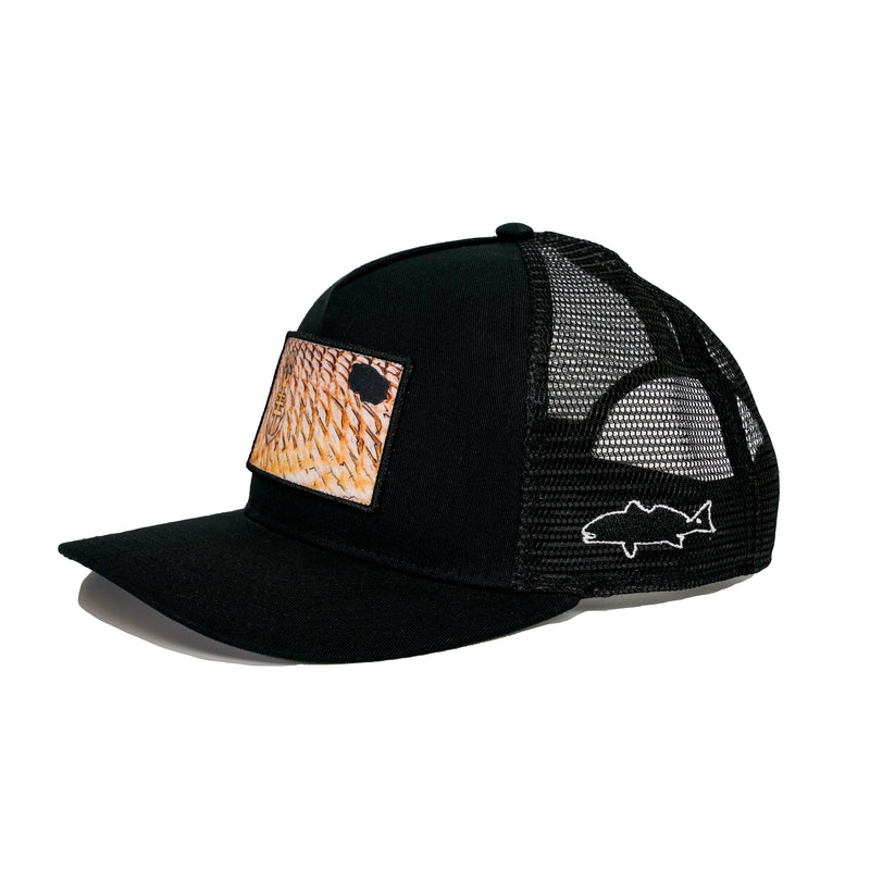 Side View of Black Hat with Redfish Scales Embroidered Patch